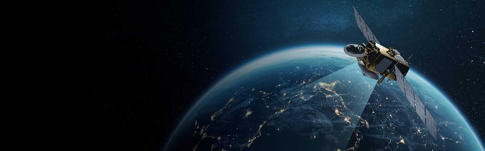 Satellite orbiting Earth at night, projecting a coverage beam over illuminated continents against a star-filled space background.